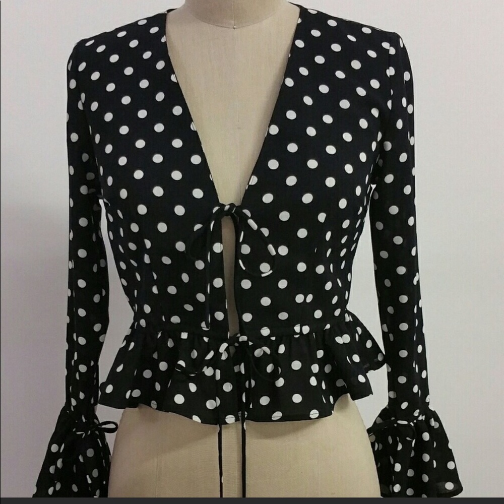 Polka dot detailed ruffled blouse